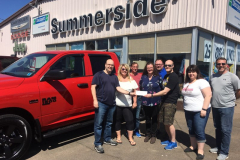 Executive of PEI Darts Association Accepting cheque from Summerside Chrysler Dodge